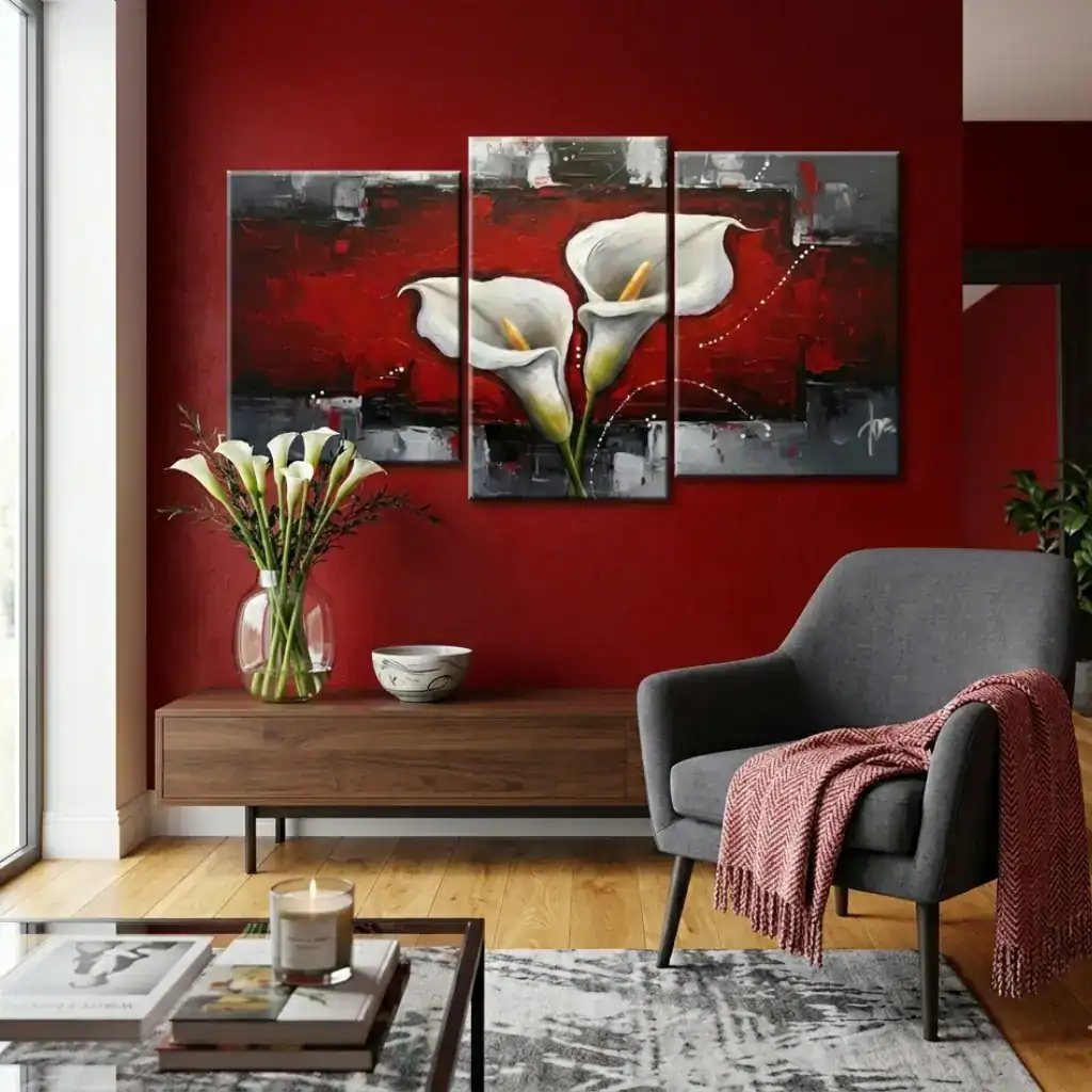 salotto moderno con parete rossa con quadro calle bianche e rosse grigie
